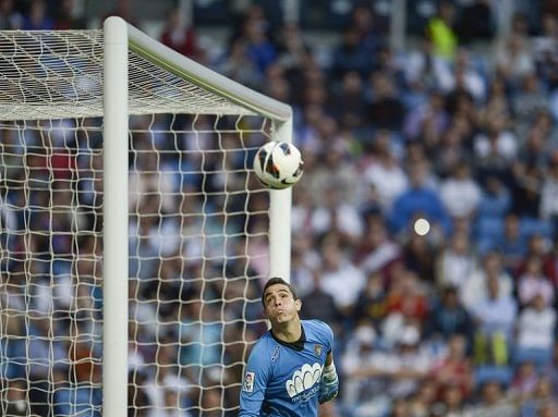 Valladolid's goalkeeper Jaime Jimenez eyes the ball during their match at Real Madrid, on May 4, 2013